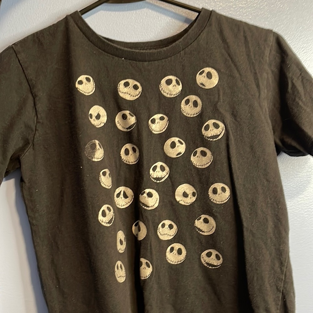 This is a bit faded but it’s a L (10/20) from Disney and it’s a cute shirt!